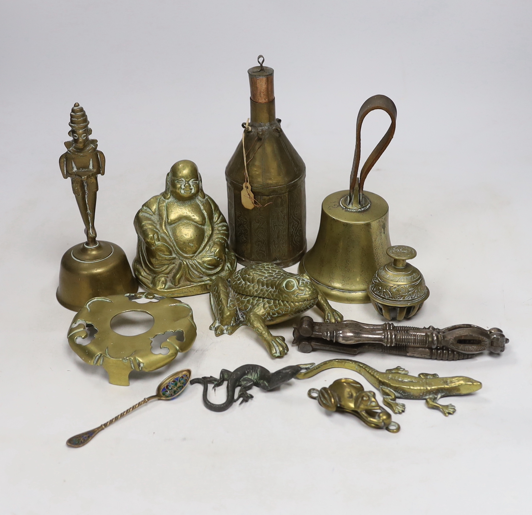 Sundry metalware including hinged brass frog with compartment, nutcrackers, a seated Buddha and a 925 gilt enamel spoon